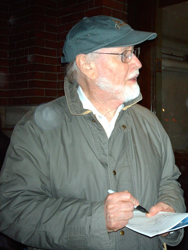 John Williams signs an autograph