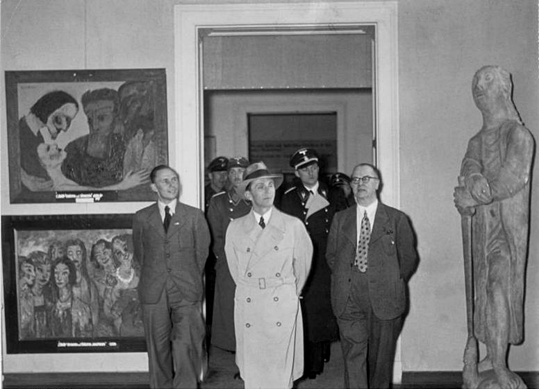 Goebbels, the Third Reich Minister of Propaganda, views the Degenerate Art exhibition in 1937